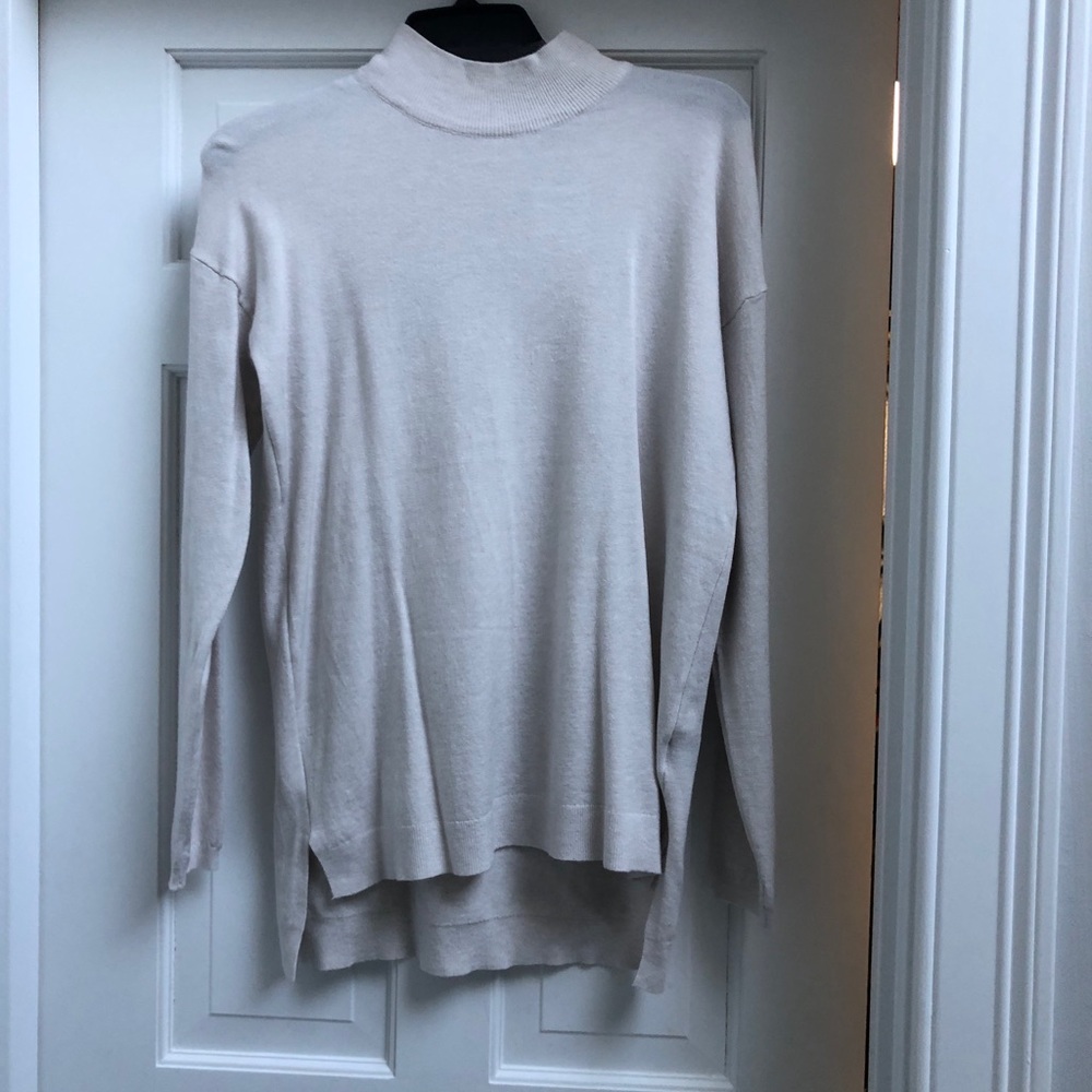 Cyrus off white turtle neck sweater with tags